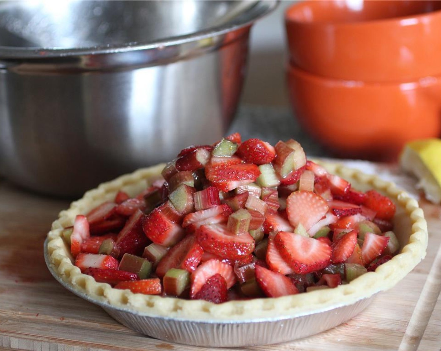 step 4 Prepare your 9-inch Pie Crust (1) and add the filling to it. Spread the filling evenly.