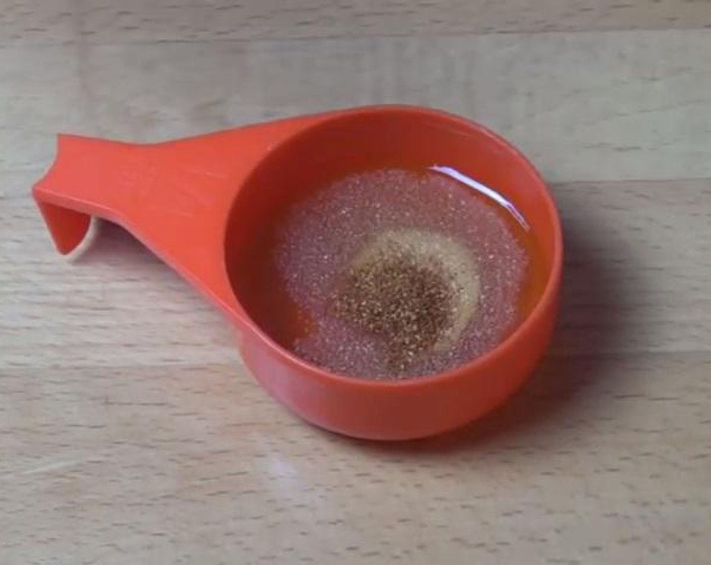 step 2 Inside a mixing cup, mix together the Olive Oil (2 Tbsp), Garlic Powder (1/2 tsp), and Cayenne Pepper (1 pinch).