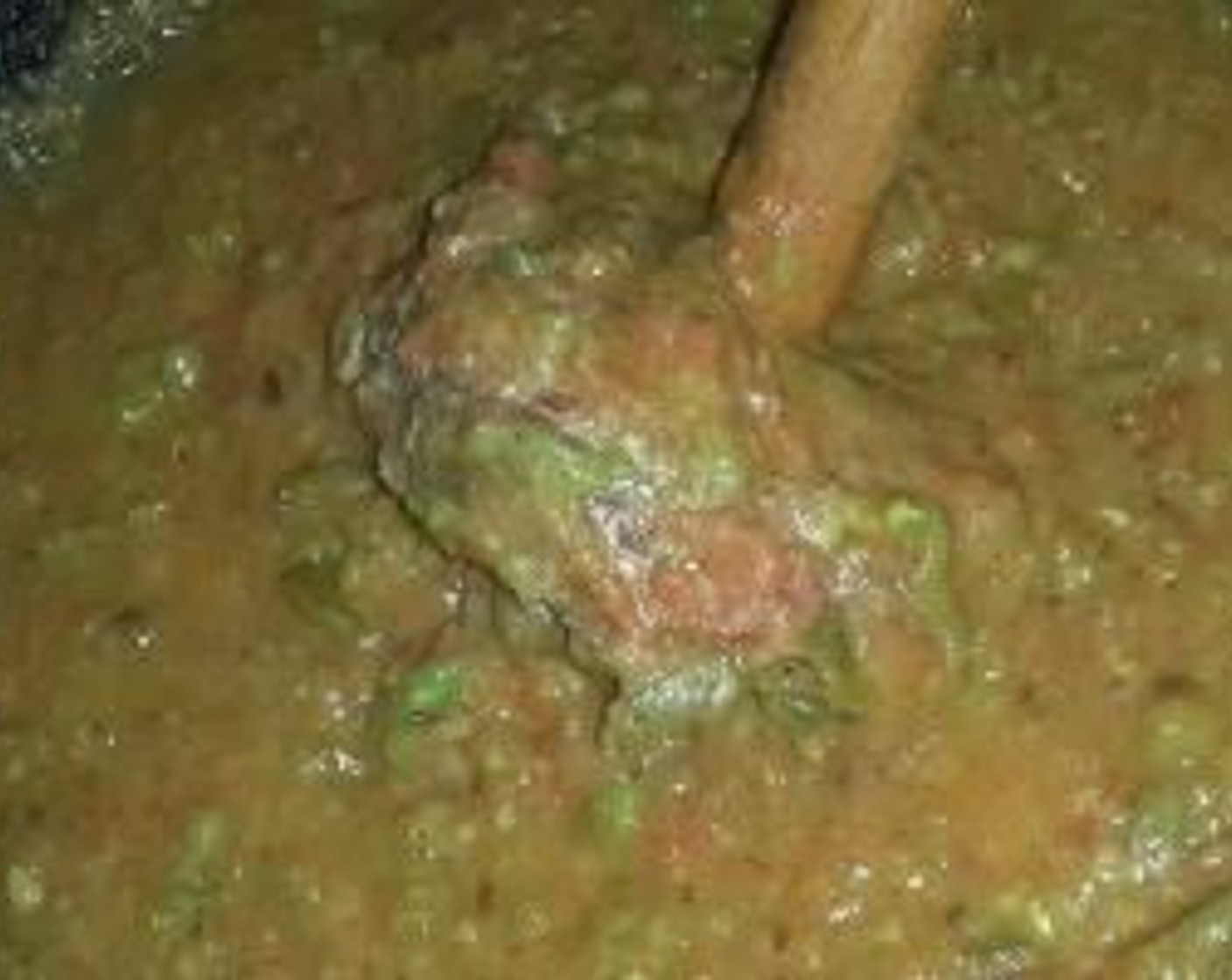 step 8 Add the peas-potatoes mixture and combine the mashed vegetables well with the masala. Add Water (1/2 cup) and combine everything well. Season with Salt (to taste). With a potato masher, mash the veggies directly in the pan. Keep on stirring occasionally and let the bhaji simmer for 12 to 15 minutes on a low flame.