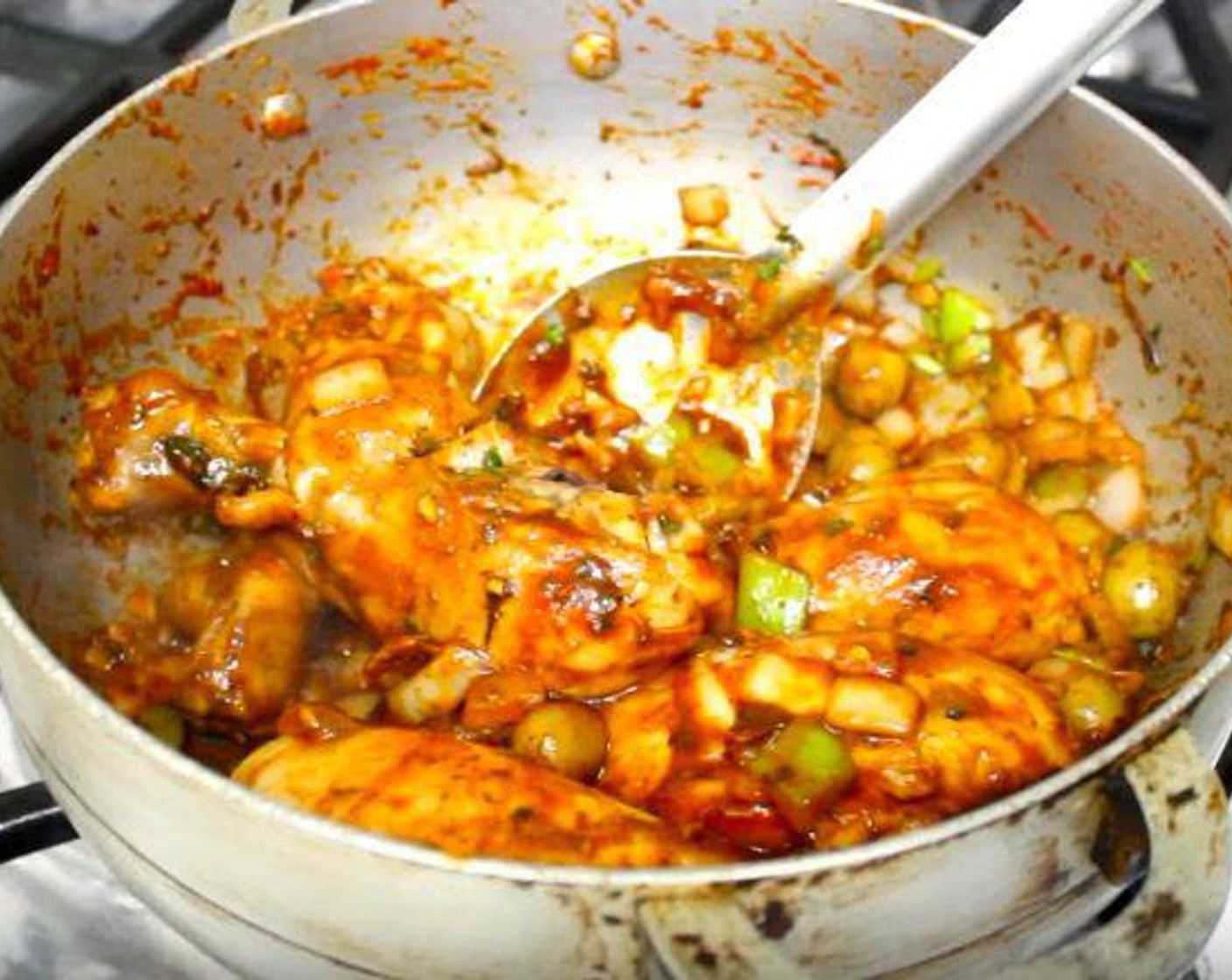 step 4 Add the vegetables, Chicken Bouillon Cubes (2) and Tomato Paste (3 Tbsp). Mix until well combined.