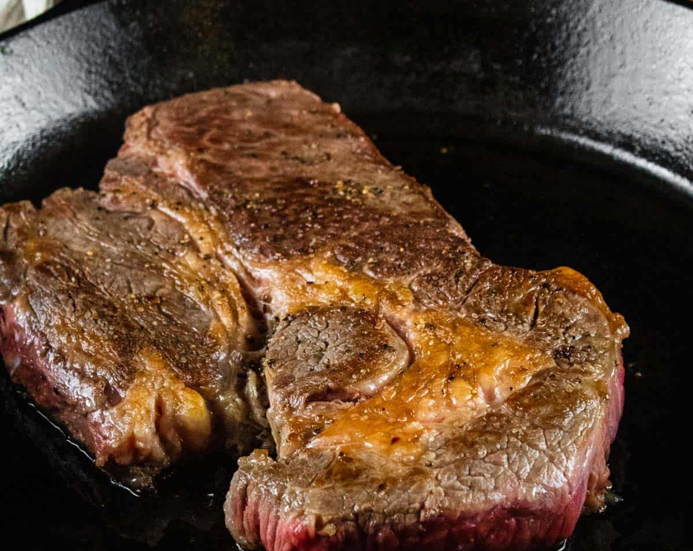 step 2 Season Beef Chuck (4 lb) with Kosher Salt (1/2 Tbsp) and Ground Black Pepper (1/2 tsp) and then sear the roast in the heated pan for 2-3 minutes on each side till browned.