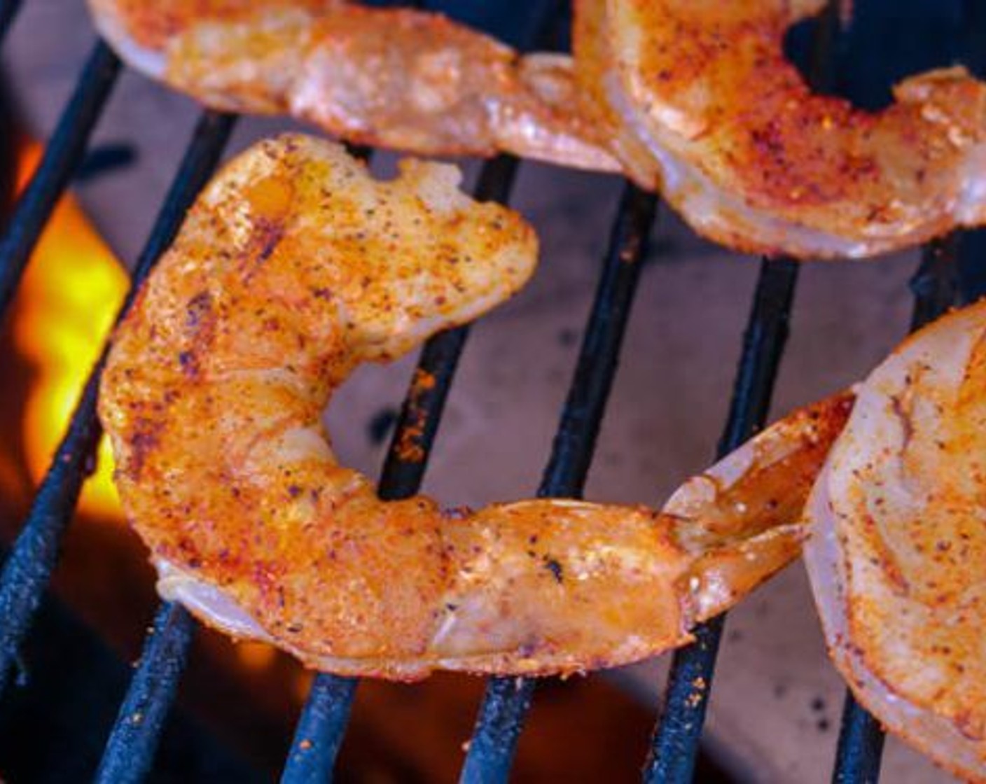 step 7 Place seasoned shrimp on grill for 1 1/2 minutes each side. Add shrimp to the iron skillet and toss to coat. Cook the shrimp in the sauce for 1-2 minutes and remove from the grill.