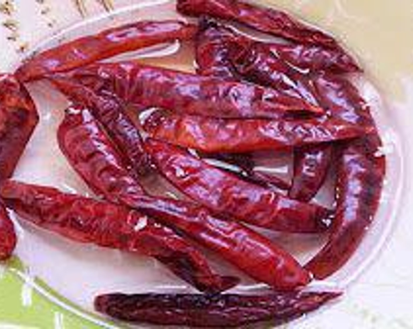 step 2 Soak the Dried Chili Peppers (12) in Water (to taste) and set aside for 15 minutes.