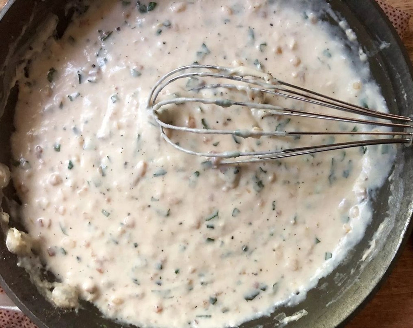 step 7 Stir in Fresh Basil (2 Tbsp), Sea Salt (1/2 tsp), Freshly Ground Black Pepper (1/4 tsp), and Ground Nutmeg (1/8 tsp). Remove from heat.