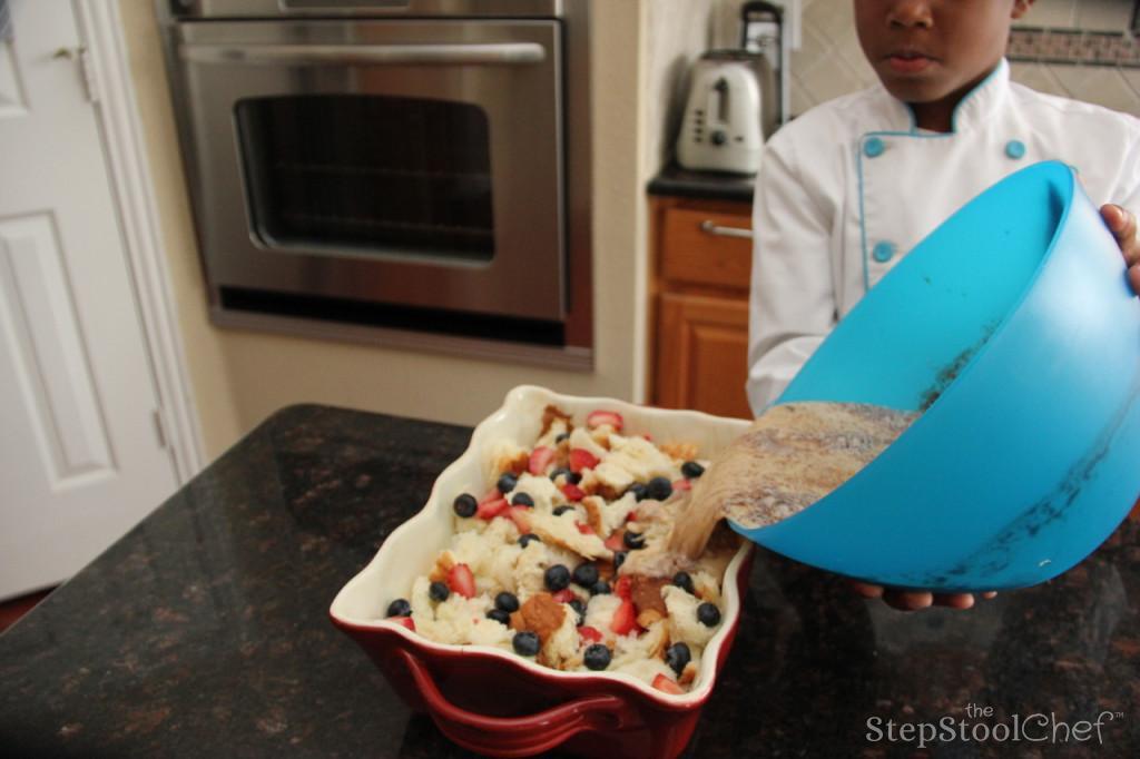 Step 6 of Berrylicious French Toast Casserole Recipe: Add the mixture to the casserole pan, and cover with plastic wrap and refrigerate the casserole overnight (or at least for 2 hours).