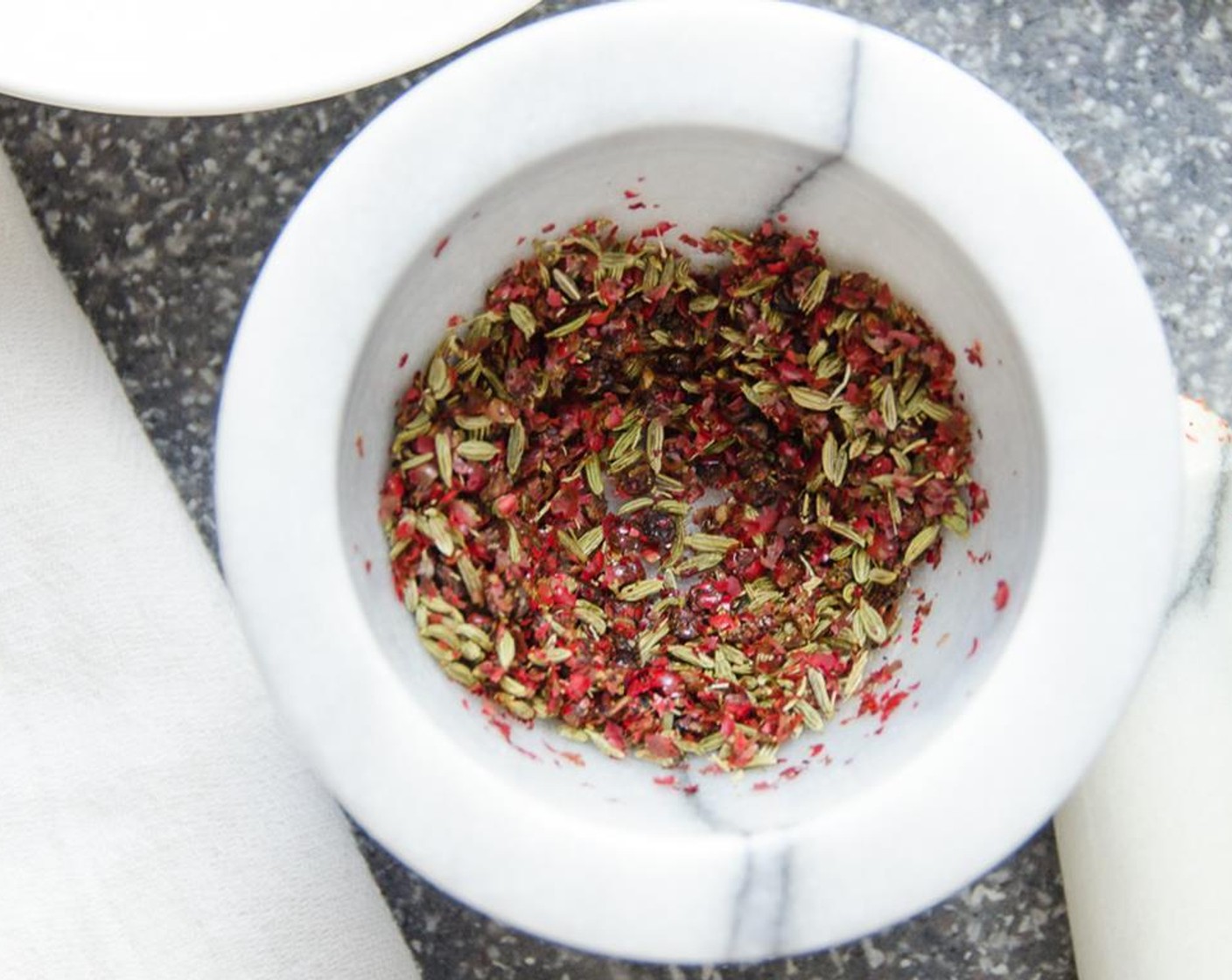 step 1 With a mortar and pestle or in a clean coffee grinder, crush the Pink Peppercorns (1 Tbsp) and Fennel Seeds (1 tsp). Transfer to a small bowl.
