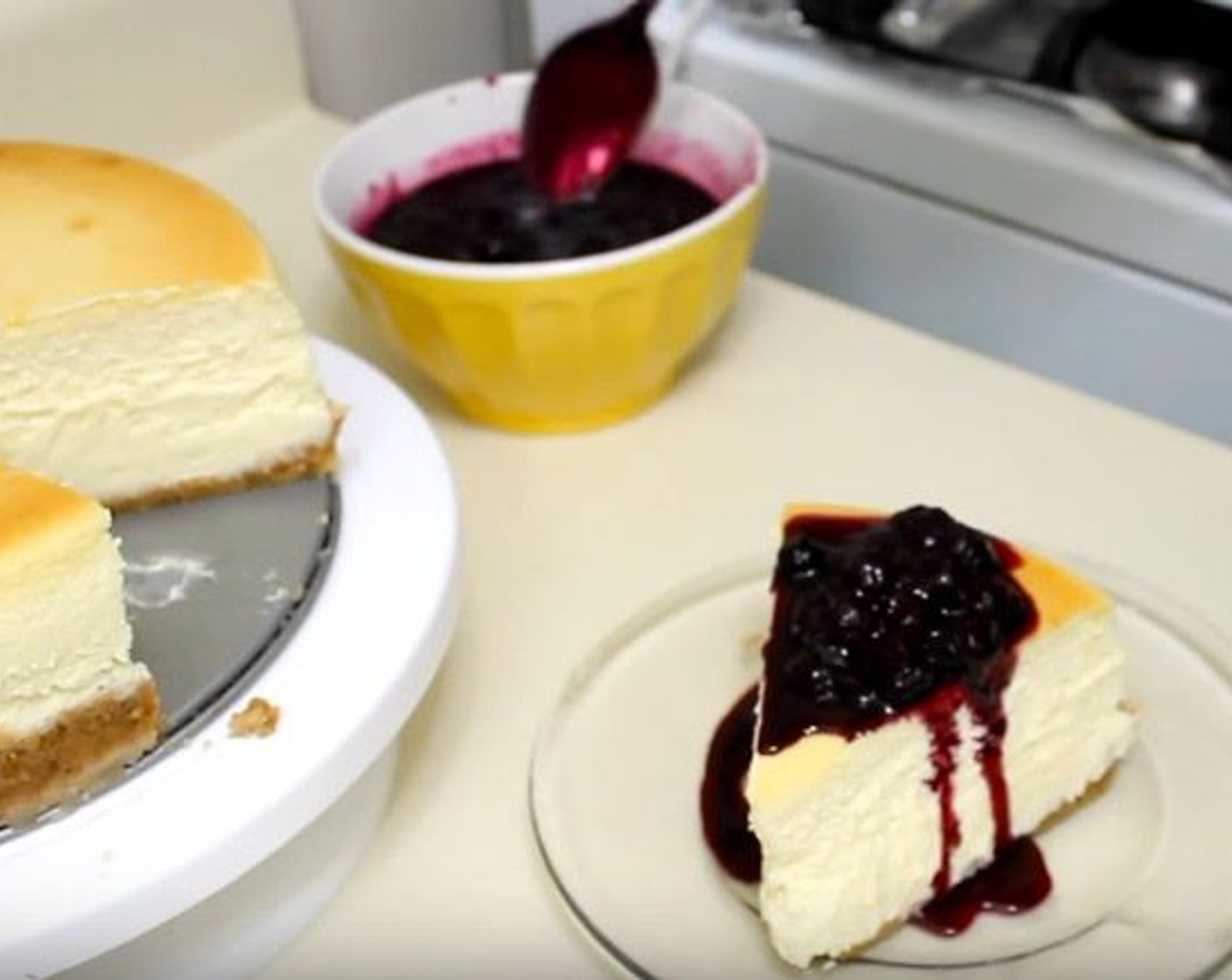 step 12 When ready to serve, top the cheesecake with the blueberry compote.