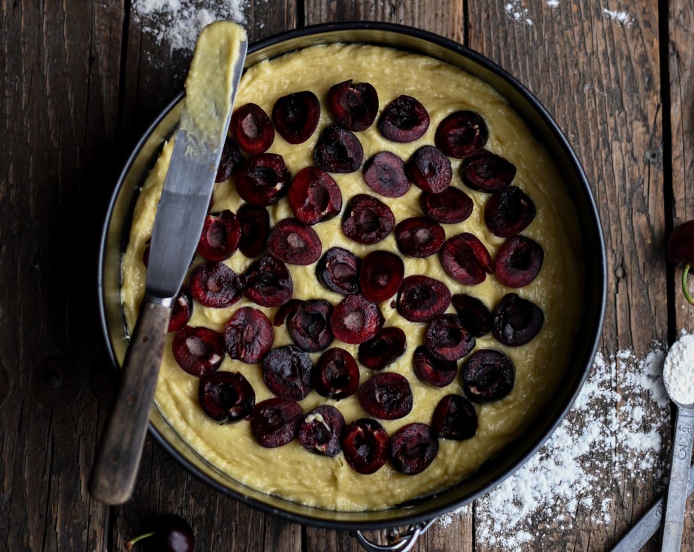 step 5 Arrange the Cherries (20) over the top of the batter and bake in the oven (fan off) for 25 minutes.