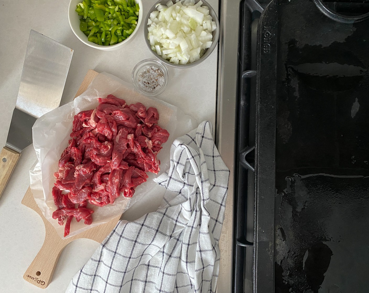 step 3 Heat 3/4 of the Olive Oil (3 Tbsp) in the pan until smoking hot. Start off by frying the beef until browned for 5-8 minutes. Season with Steak Seasoning (1/2 Tbsp). Do not overcook.