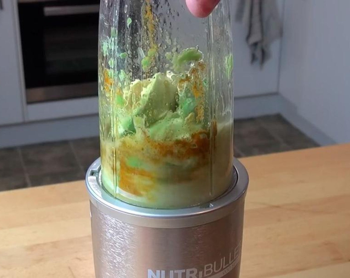 step 2 Scoop out the Avocados (2) into a mixer. Add Olive Oil (1/4 cup), Freshly Squeezed Lemon (1), Ground Cumin (1 tsp), Ground Turmeric (1/4 tsp), Salt (to taste), and Ground Black Pepper (to taste). Use the mixer to create the sauce.