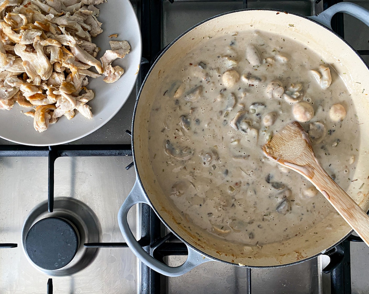 step 5 Stir in the All-Purpose Flour (1/4 cup) and add the Cream of Mushroom Soup (1 can), Chicken Broth (1 cup), and Milk (1 1/2 cups) and mix until well combined and starts to bubble. Taste and season with salt and pepper, if needed.