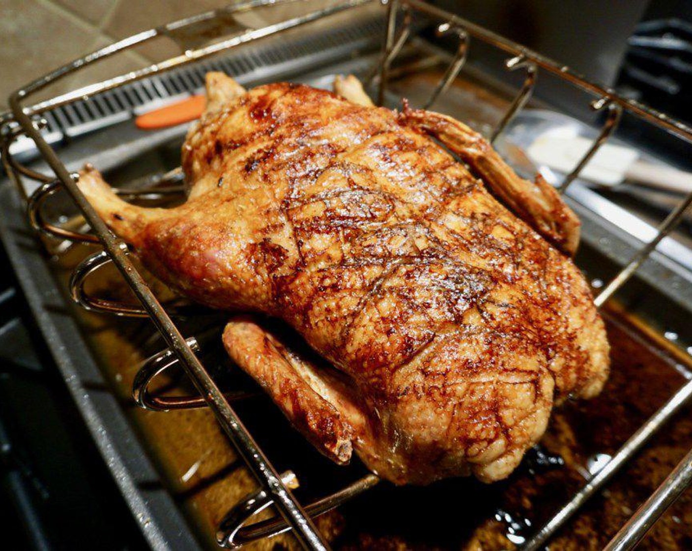 step 7 Turn the oven up to 400 degrees F (200 degrees C) and cook for another 30 minutes, breast side up, to get the skin crispy.