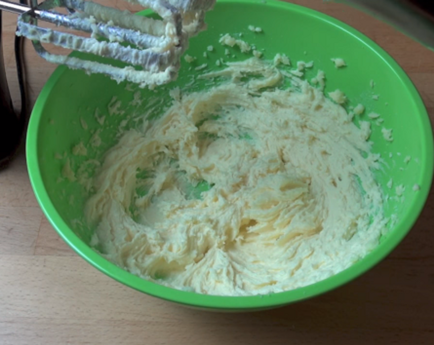 step 4 In a mixing bowl, add Butter (5.5 oz), Caster Sugar (3/4 cup), and Vanilla Extract (2 tsp). Using a hand mixer, beat together for 5 minutes or until light and fluffy.