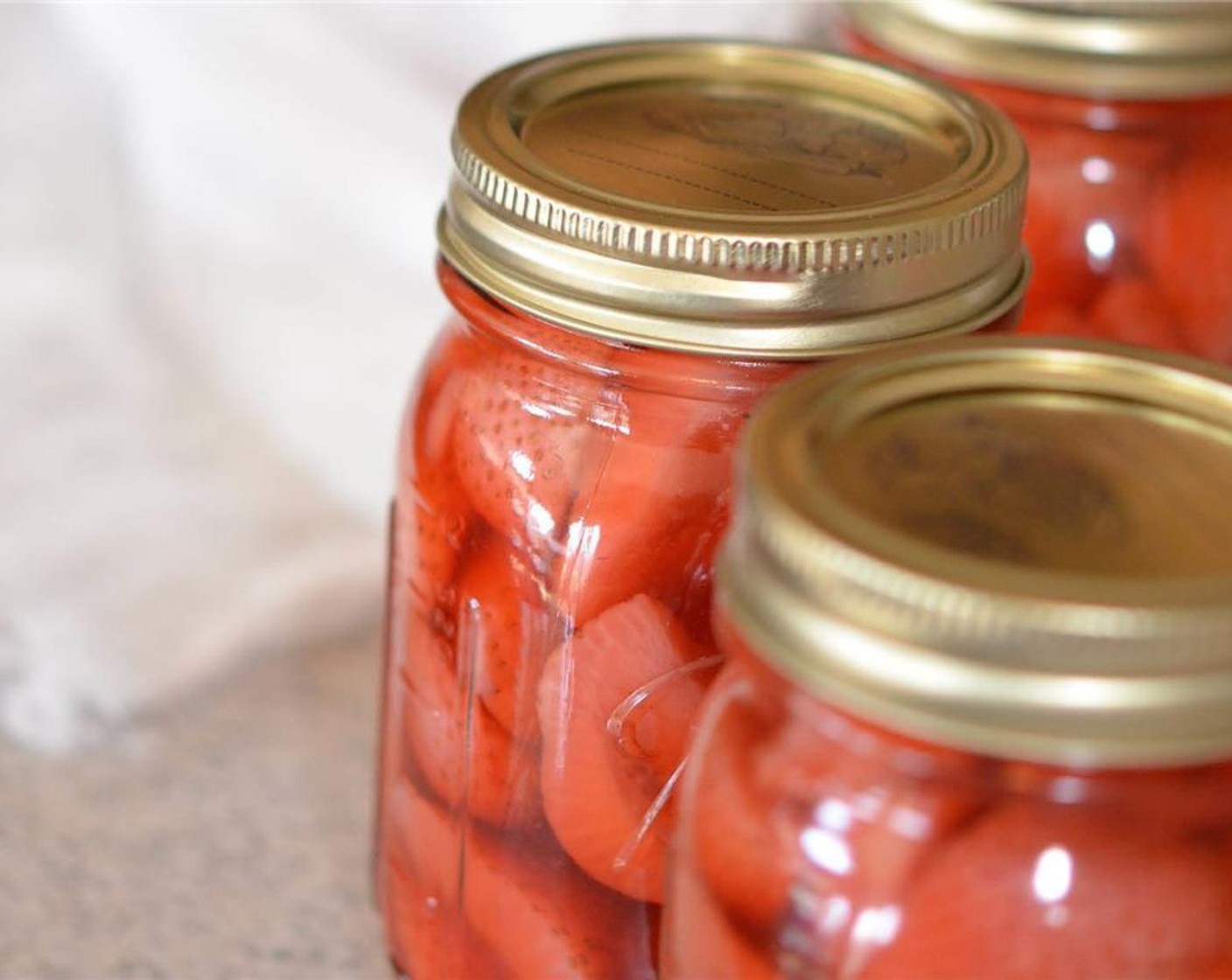 step 4 Screw lids onto mason jars and place in a dry dark place for three days, shake jars once daily.