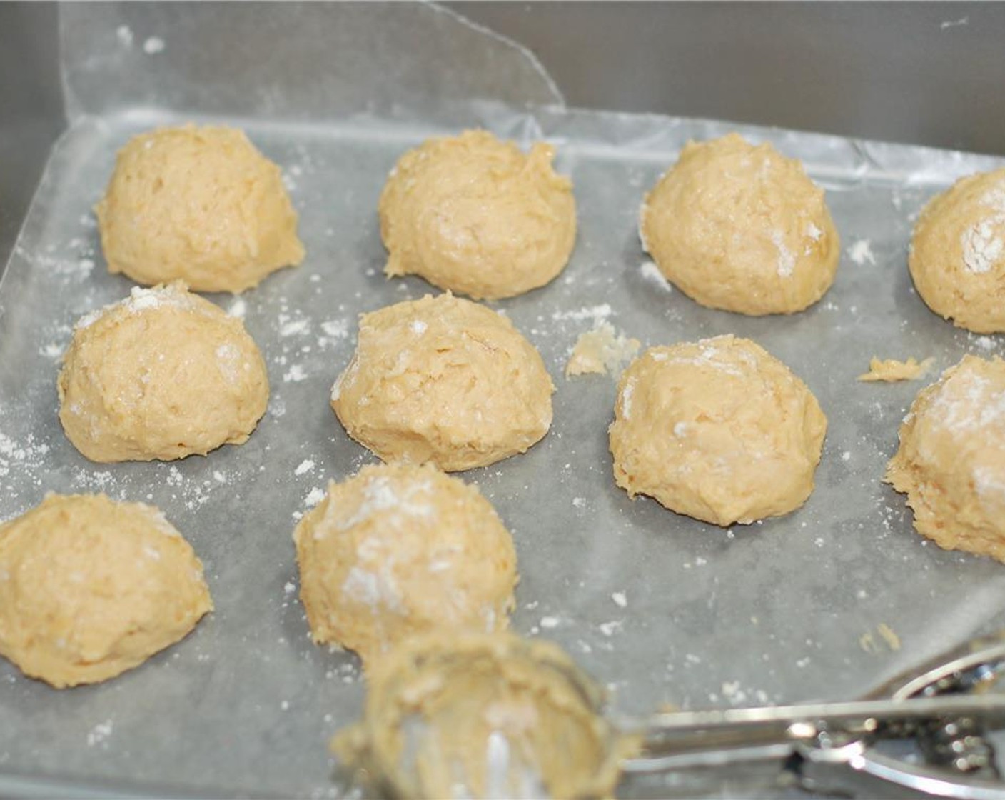 step 5 With a cookie scoop, measure out 27 mounds and place them on a wax paper-lined air-tight container. Place the container in the freezer for at least 1 hour to set.