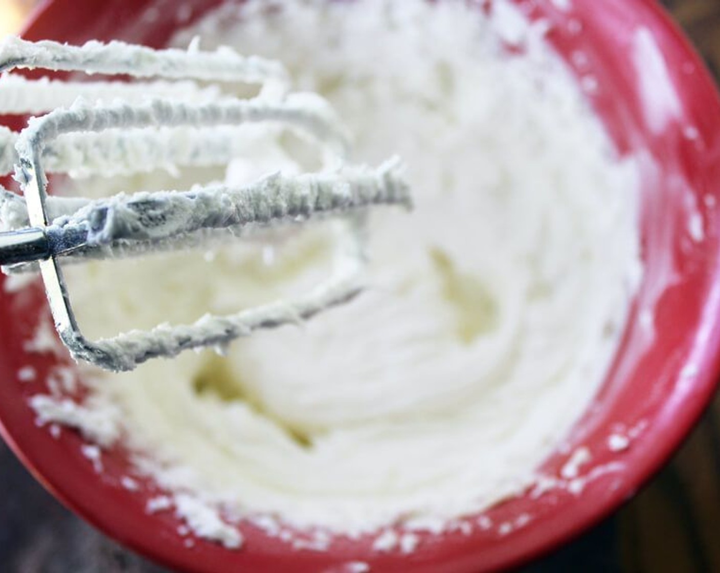 step 7 While the cakes are baking, make the buttercream frosting. On high speed using a hand held mixer, cream the Butter (1 cup) until light and fluffy. Gradually add the Powdered Confectioners Sugar (4 cups). Continue to mix for 5 minutes until smooth and fluffy.