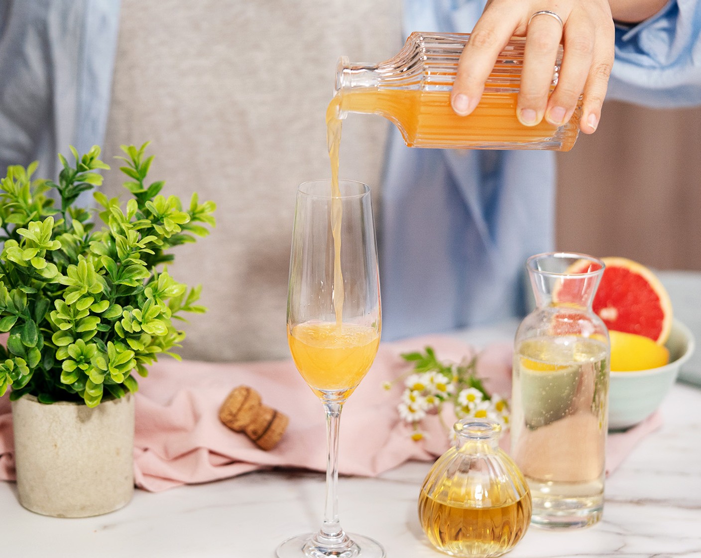 step 1 In a champagne flute, add the Grapefruit Juice (2 fl oz) and Elderflower Liqueur (1 fl oz).