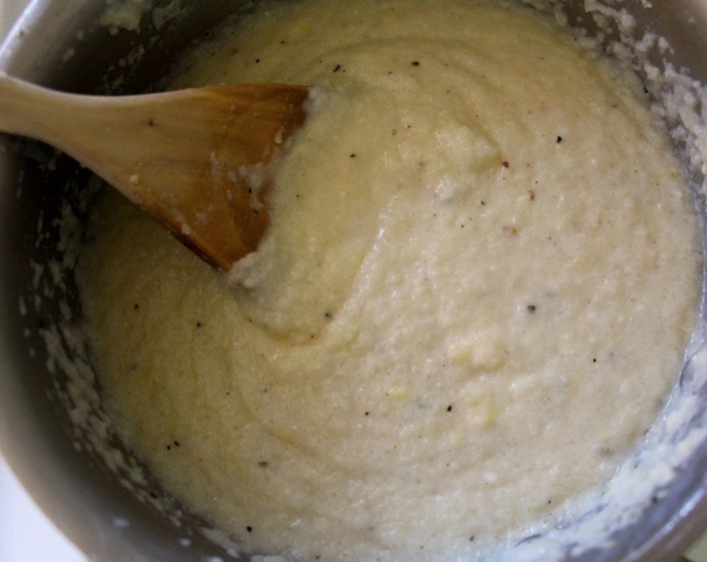 step 12 Drain and transfer the cauliflower to the bowl of a food processor fitted with a steel blade. Process until the cauliflower is pureed, about 30 seconds. Stir in 1/2 teaspoon of Kosher Salt (to taste) and 1/4 teaspoon of Freshly Ground Black Pepper (to taste). Set aside.