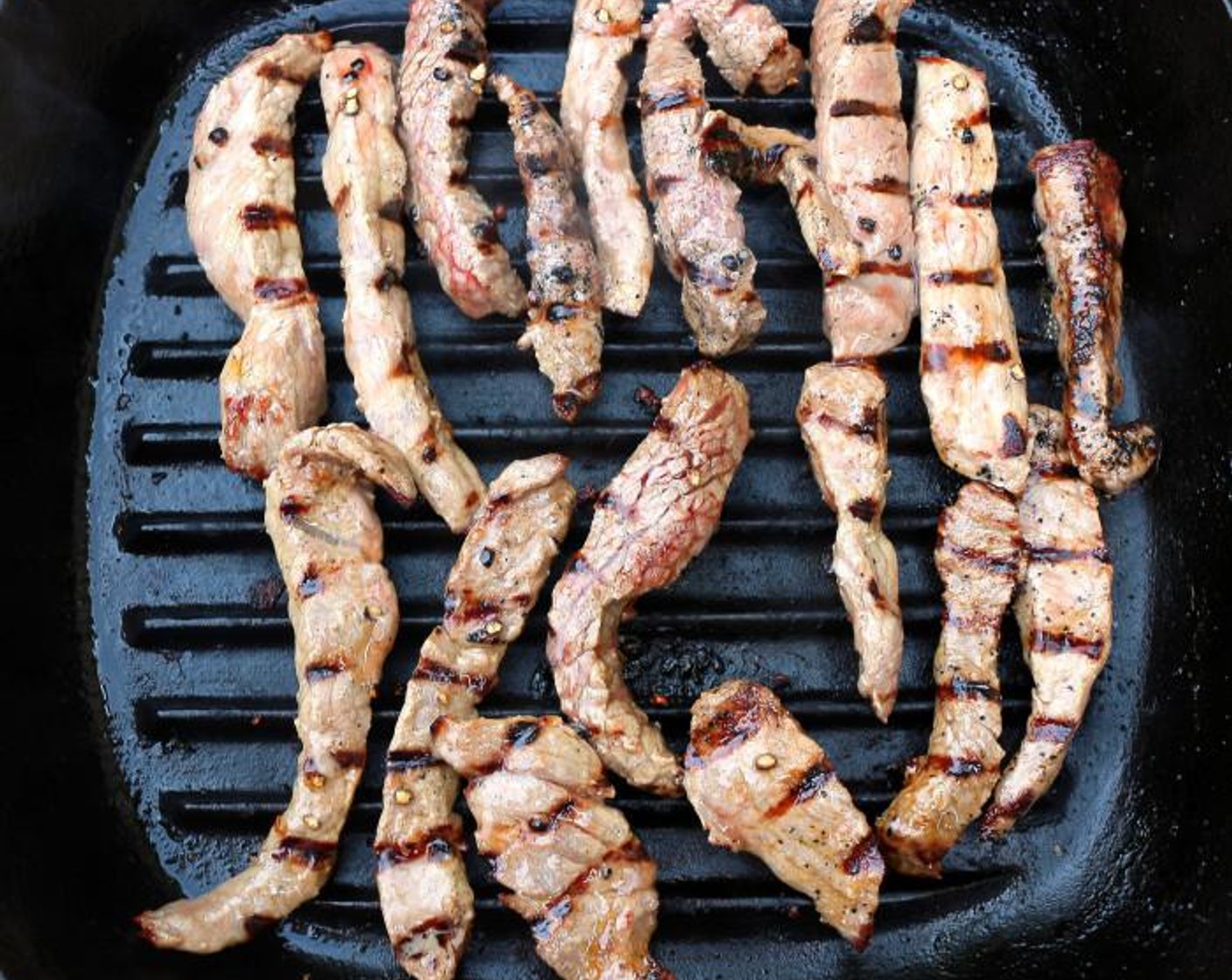 step 6 Grill the steak or cook on a grill pan. This can also be done in a regular skillet if needed.