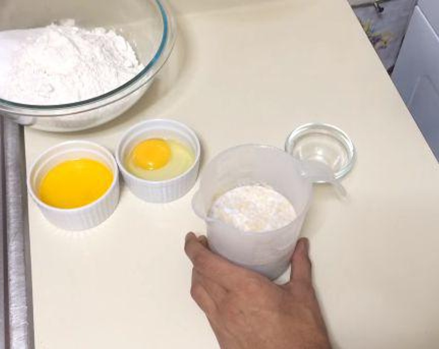 step 2 Add the Instant Dry Yeast (2 tsp) and the Granulated Sugar (1 tsp) to the milk, mix a bit, and let sit for five minutes.
