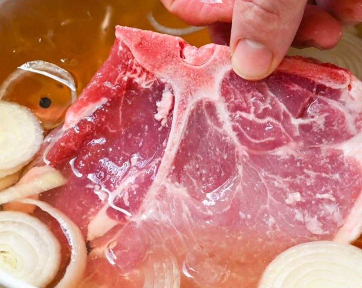 step 4 Add Pork Chops (2 lb), making sure they are covered by the brine solution.