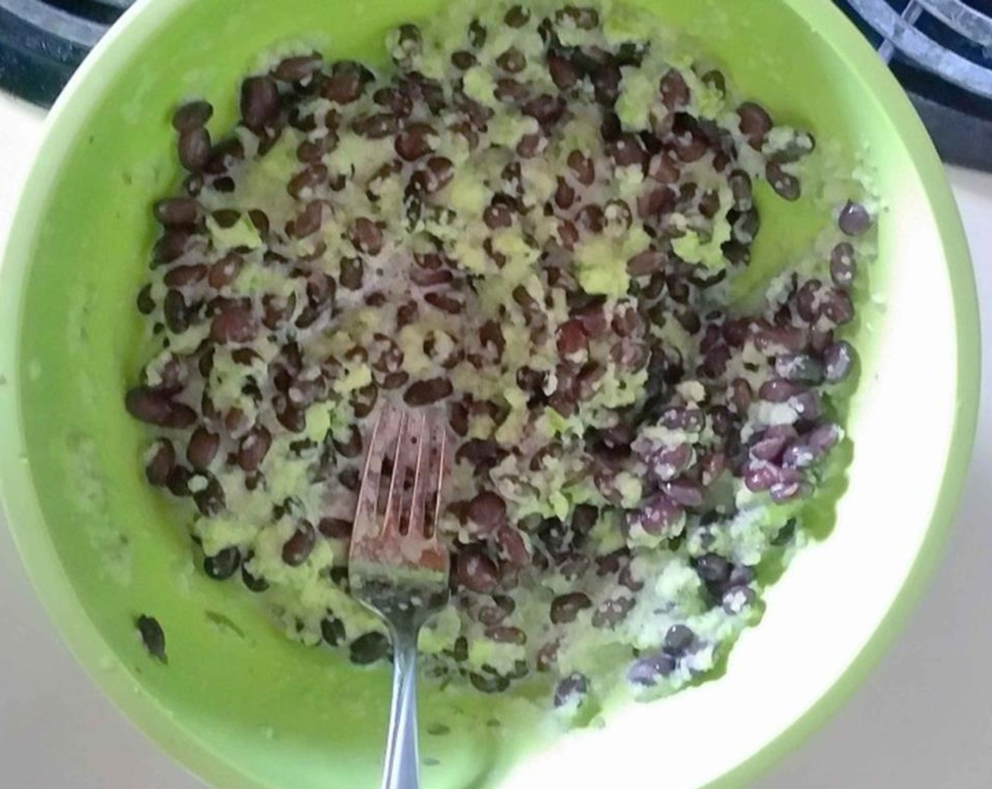step 1 Start by chopping the Green Bell Pepper (1) and Onion (1/2) up into chunks to put in your food processor. Then put the chunks in your food processor and pulse until you have a smooth, somewhat watery paste. Add this to your GOYA® Black Beans (2 1/3 cups).