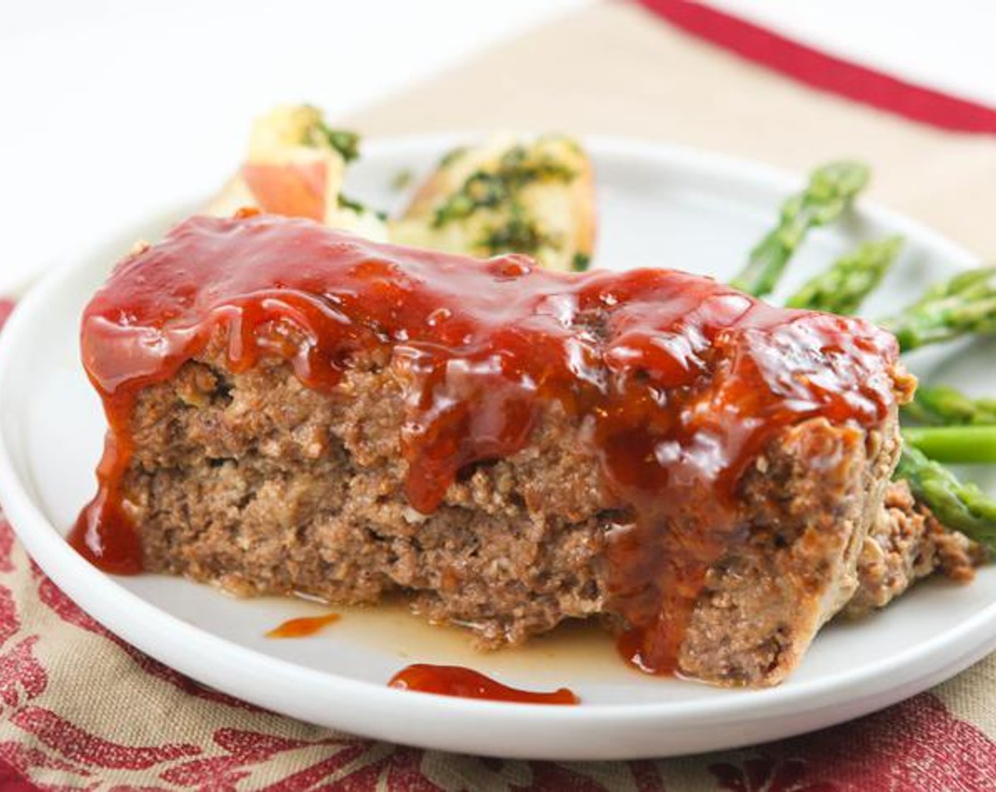 step 6 Reserve the remainder of the sauce for dipping and/or topping. Let meatloaf sit for 15 minutes before slicing and serving.