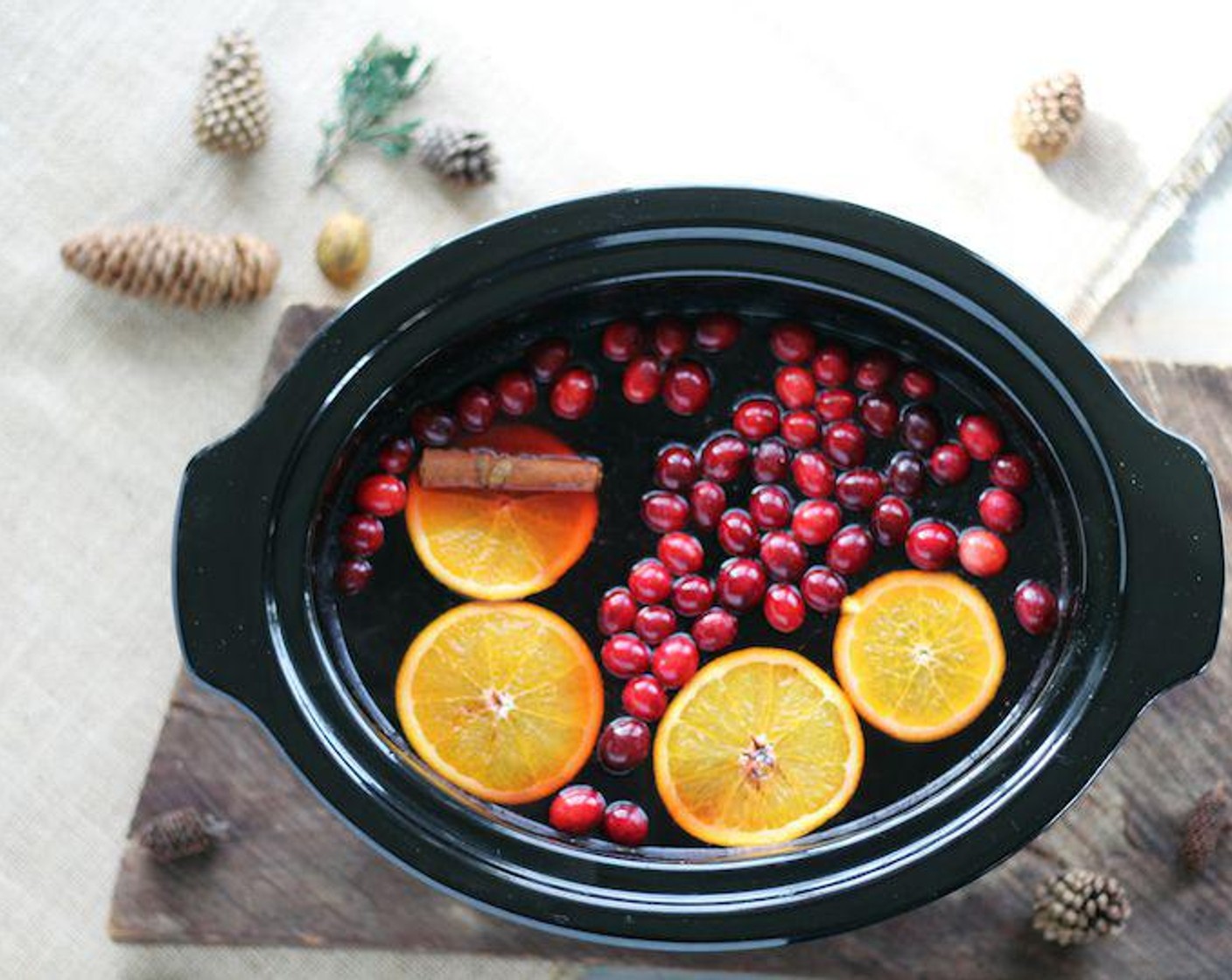 step 1 Pour the Cranberry Juice (8 cups), Apple Cider (8 cups) and Red Hots® Cinnamon Candy (1 cup) into a large crockpot. Heat on high, stirring often to dissolve the candies.