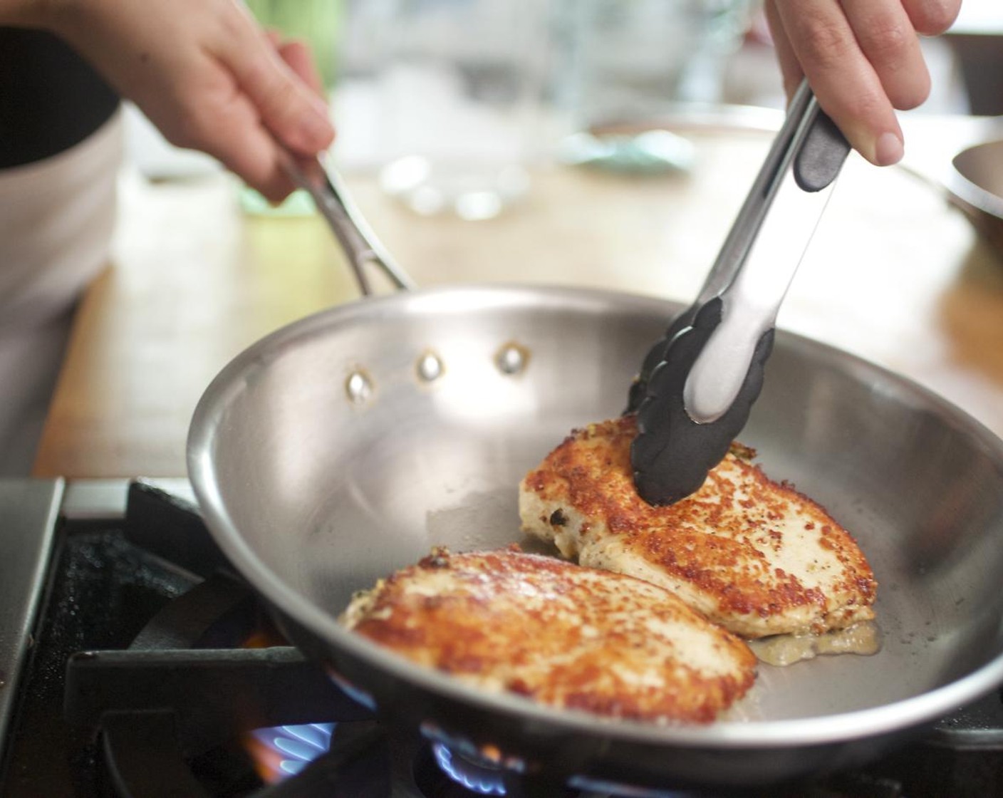 step 9 Heat Olive Oil (1 Tbsp) in a medium sauté pan over medium-high heat. When hot, add the chicken and cook for 5 minutes on one side.