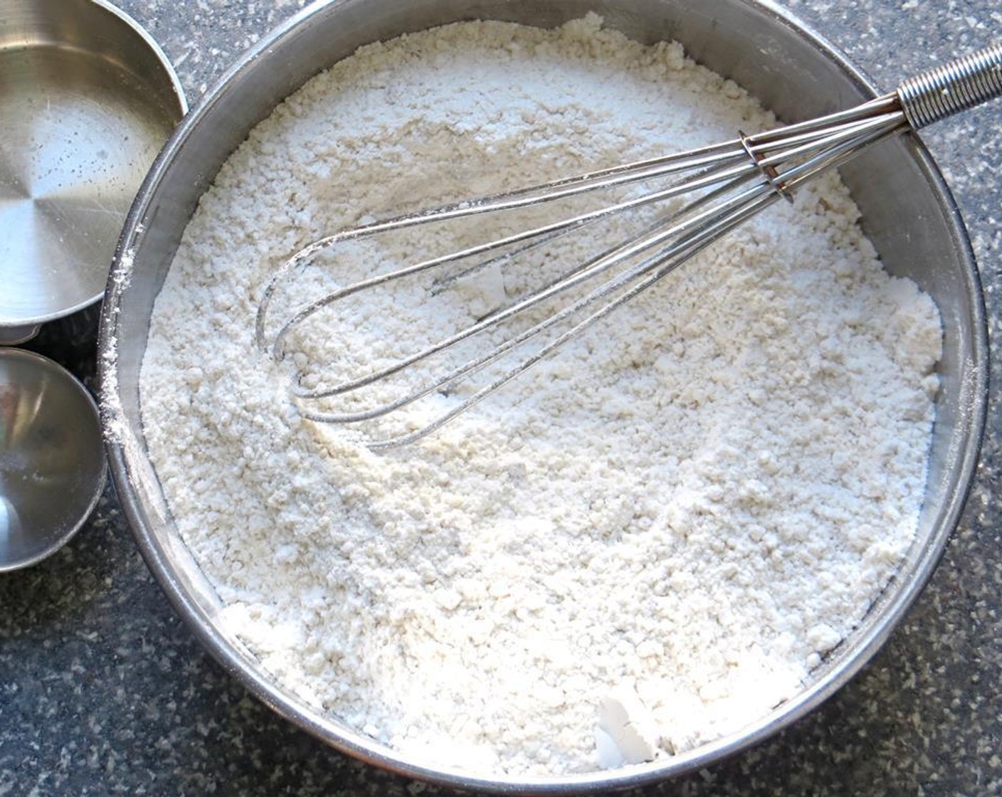 step 4 Transfer the nuts to a medium bowl and add the Cake Flour (1 2/3 cups), Baking Powder (2 tsp), Simply Organic Cinnamon, Ground (2 tsp) and Kosher Salt (1 tsp). Whisk to combine and set aside.