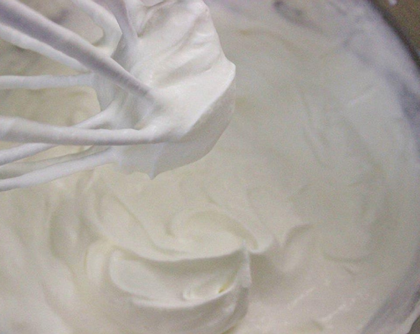 step 10 In another chilled bowl with a chilled whisk attachment, whip the Heavy Cream (1 cup) until stiff but still somewhat soft peaks form.