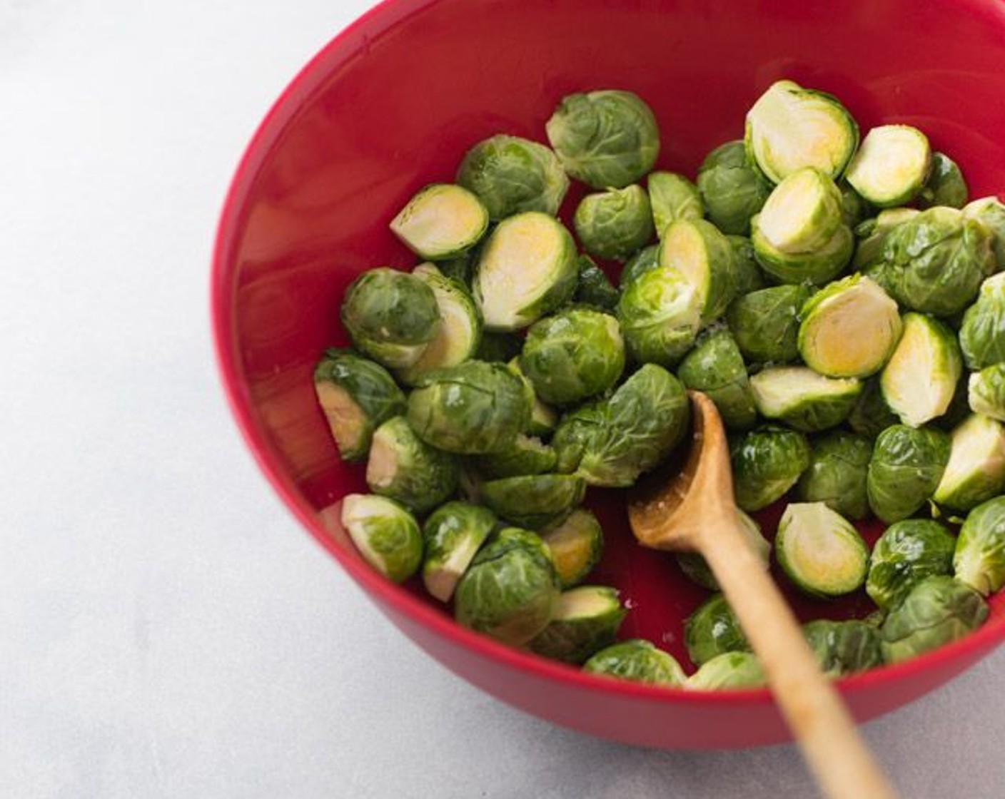 step 3 In a mixing bowl, combine the Brussels Sprouts, Extra-Virgin Olive Oil (2 Tbsp) and Sea Salt (1/4 tsp). Toss until well coated.