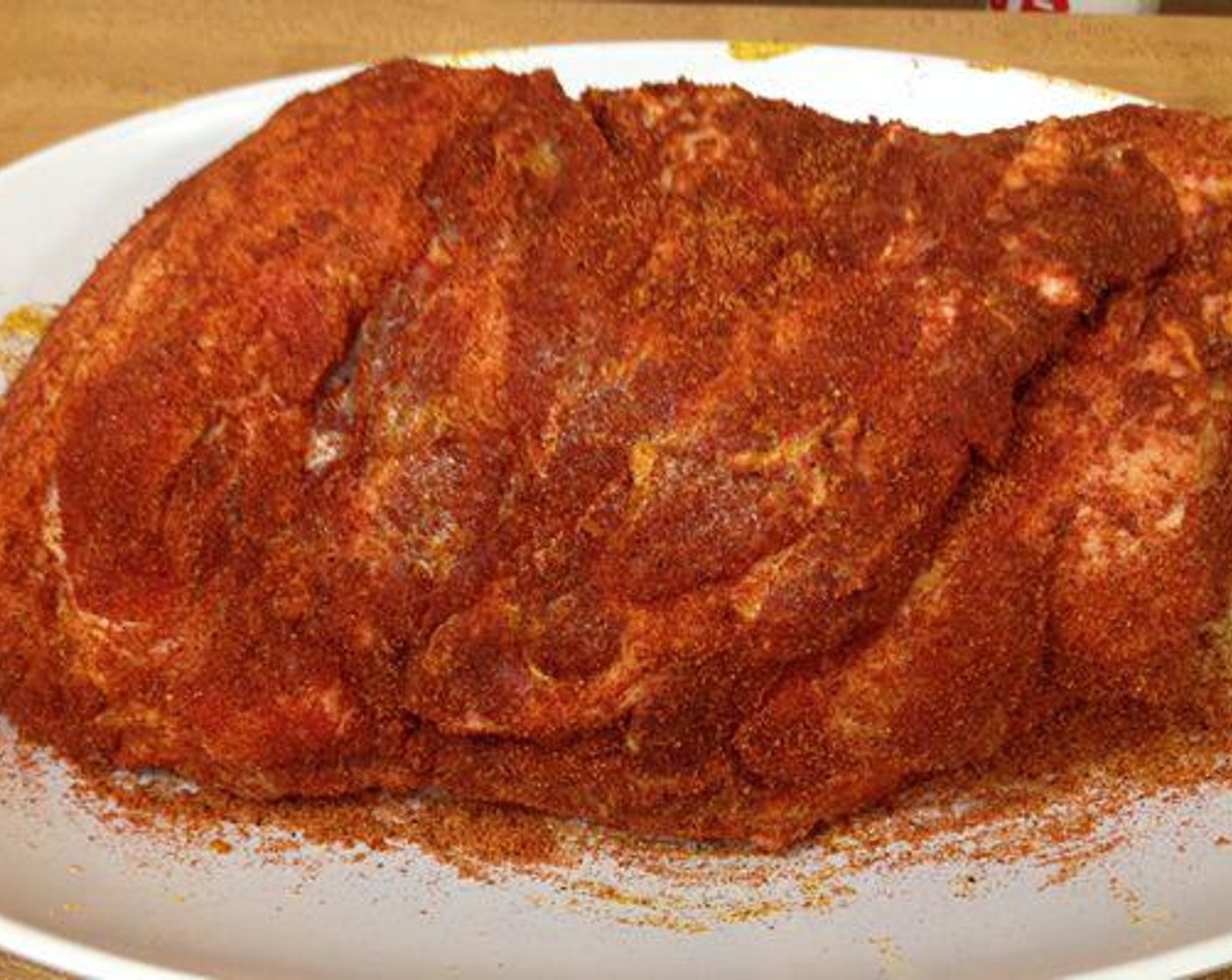 step 2 To make fresh barbecue, coat the Pork Shoulder (8 lb) with Yellow Mustard (2 Tbsp). Then liberally sprinkle Barbecue Rub (to taste) over the pork and gently massage it into the meat.