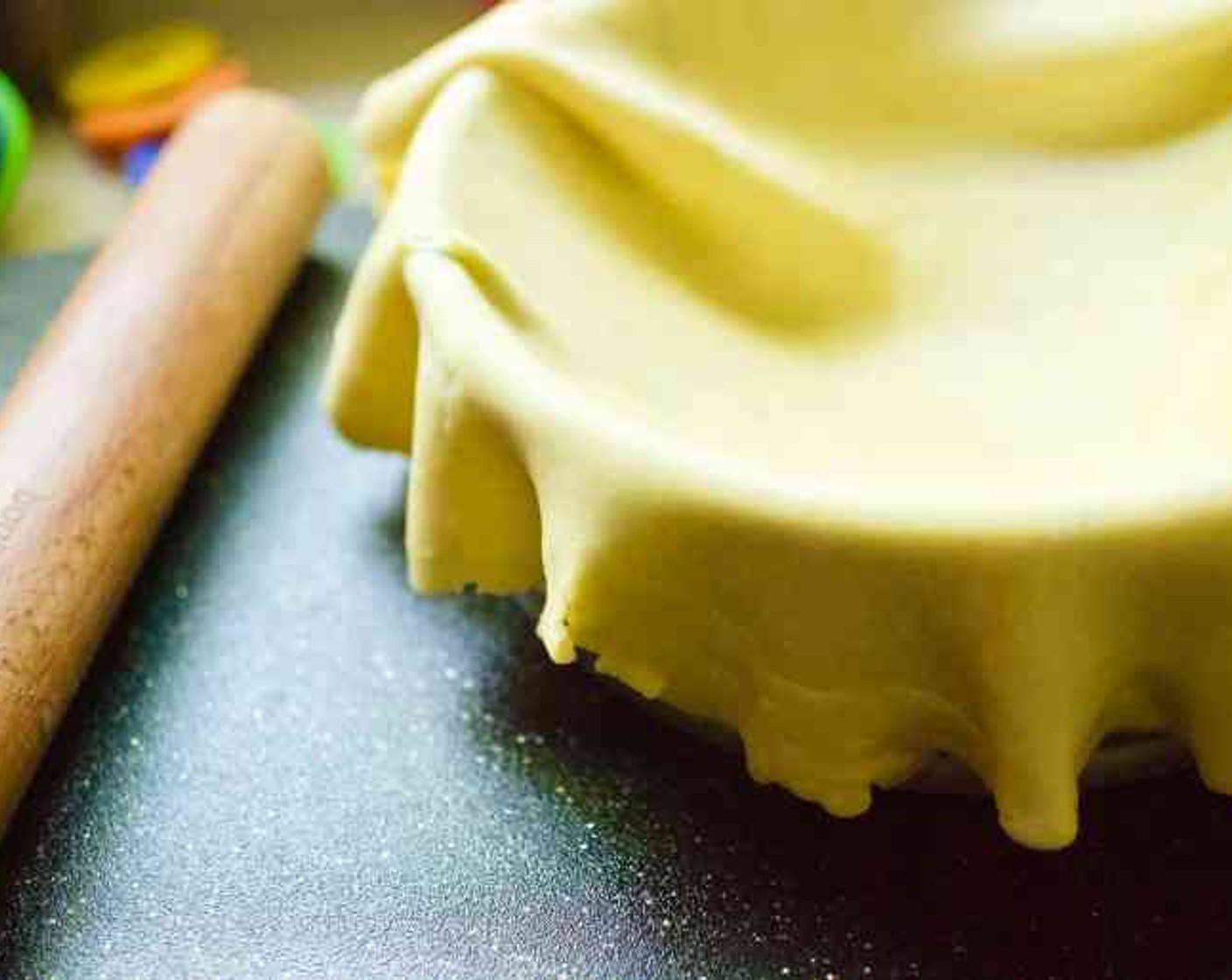 step 4 Turn the chilled dough out onto a lightly floured surface and roll it out to a 15-inch circle. Carefully roll the pastry around the rolling pin and transfer to a 9x2 1/2-inch springform pan, pressing it into the sides.