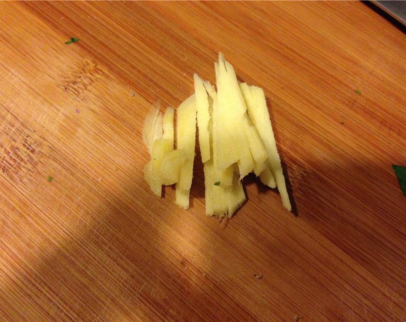 step 6 Peel and slice the Fresh Ginger (2 in) into thin strips.