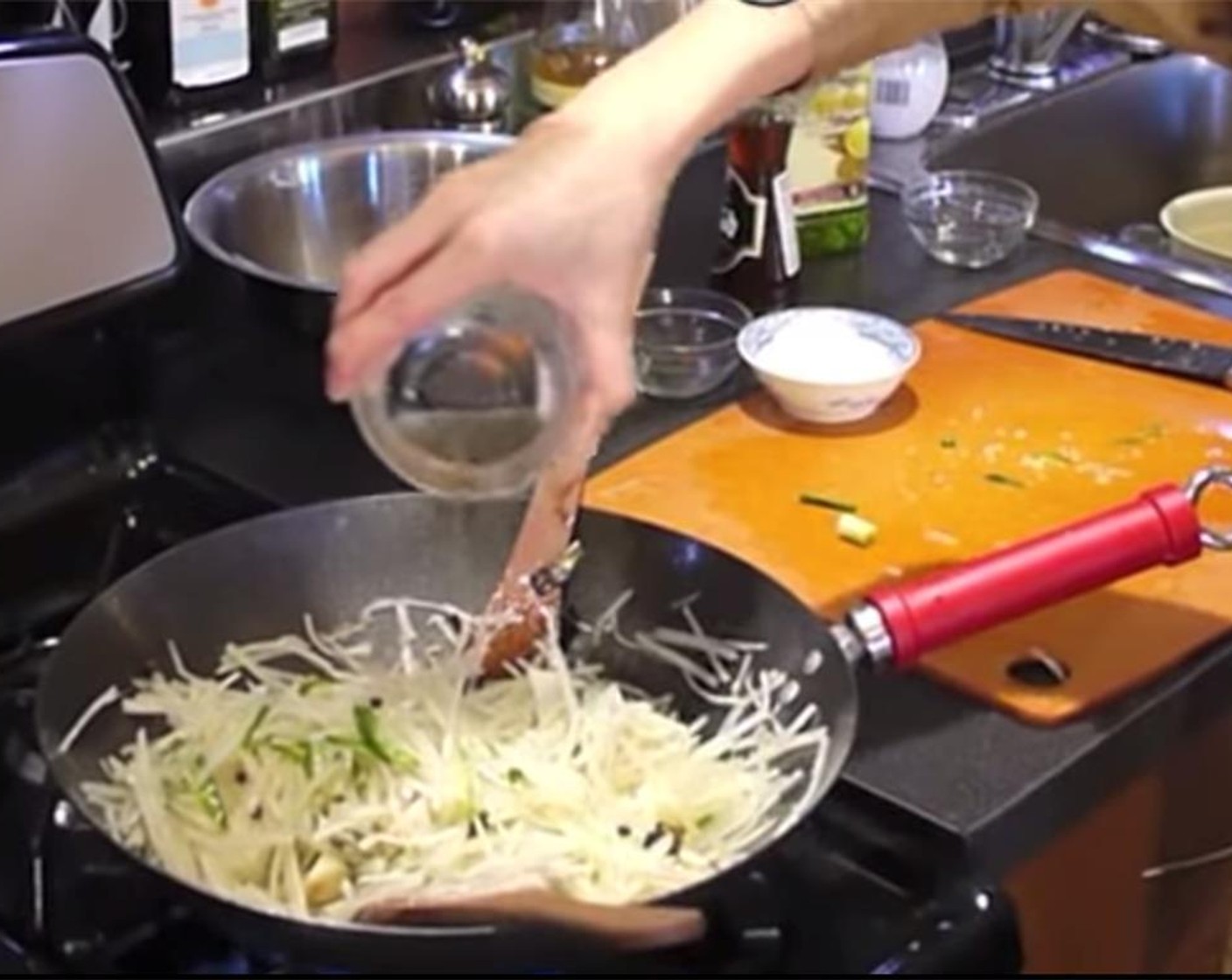 step 8 Add in the potato strips and stir well. Add in the green chilis and keep mixing for a few minutes. Then add Chicken Stock (1/4 cup), Salt (to taste), and Rice Vinegar (1/4 cup).