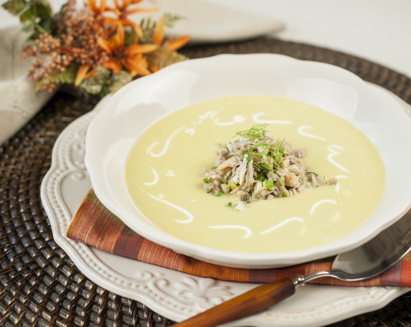 step 6 Scoop approximately 1/4 cup of crab salad into the centre of shallow serving bowls. Ladle soup around crab salad and drizzle with a spoon of Sour Cream (1/3 cup) swirling into soup slightly. Serve immediately.