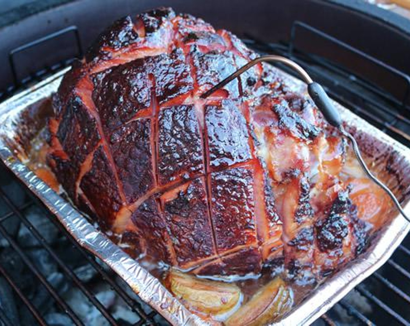 step 6 Once the ham reaches an internal temperature of 135 degrees F (57 degrees C), brush the glaze over the outside of the ham and continue cooking until internal temperature hits 140 degrees F (60 degrees C).