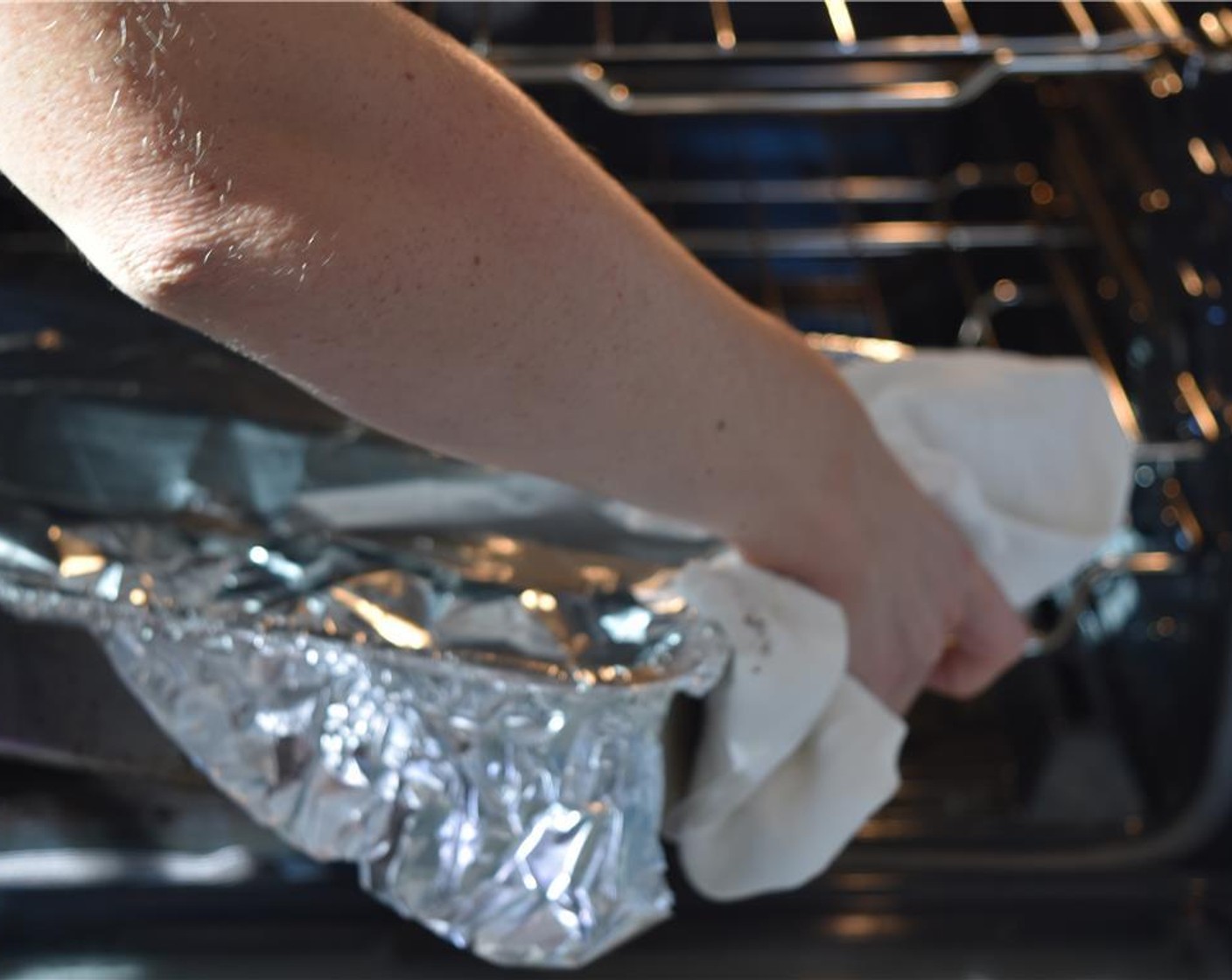 step 12 Gently nestle the short ribs in the braising liquid. Tightly cover with a lid or foil and transfer to the oven.