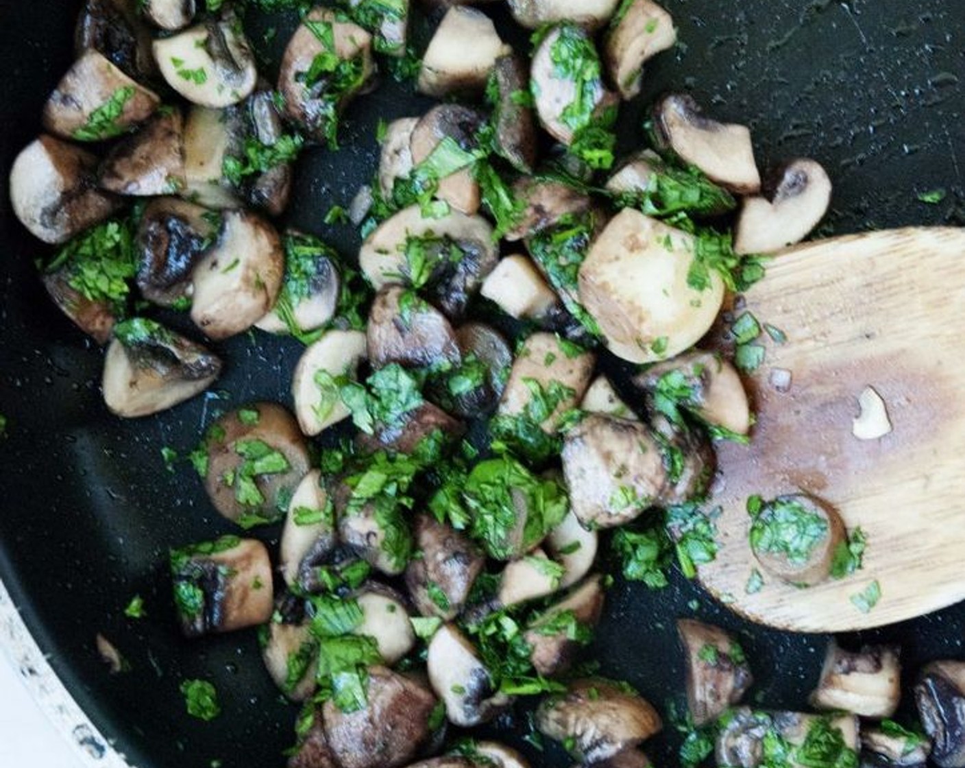 step 4 In a skillet, heat up the Extra-Virgin Olive Oil (1 Tbsp) and the chopped Garlic add the mushrooms, season with Salt (to taste) and Ground Black Pepper (to taste), and cook on medium-high for about 10 min, or until mushrooms start to soften.
