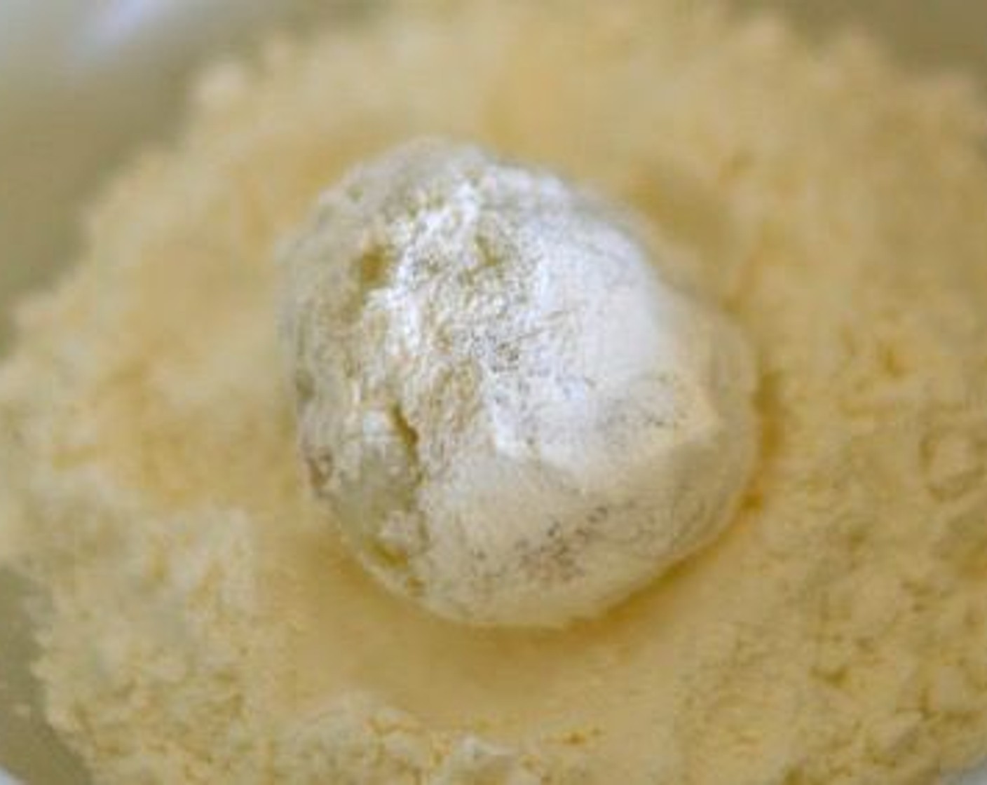 step 7 Dip croquette into flour.