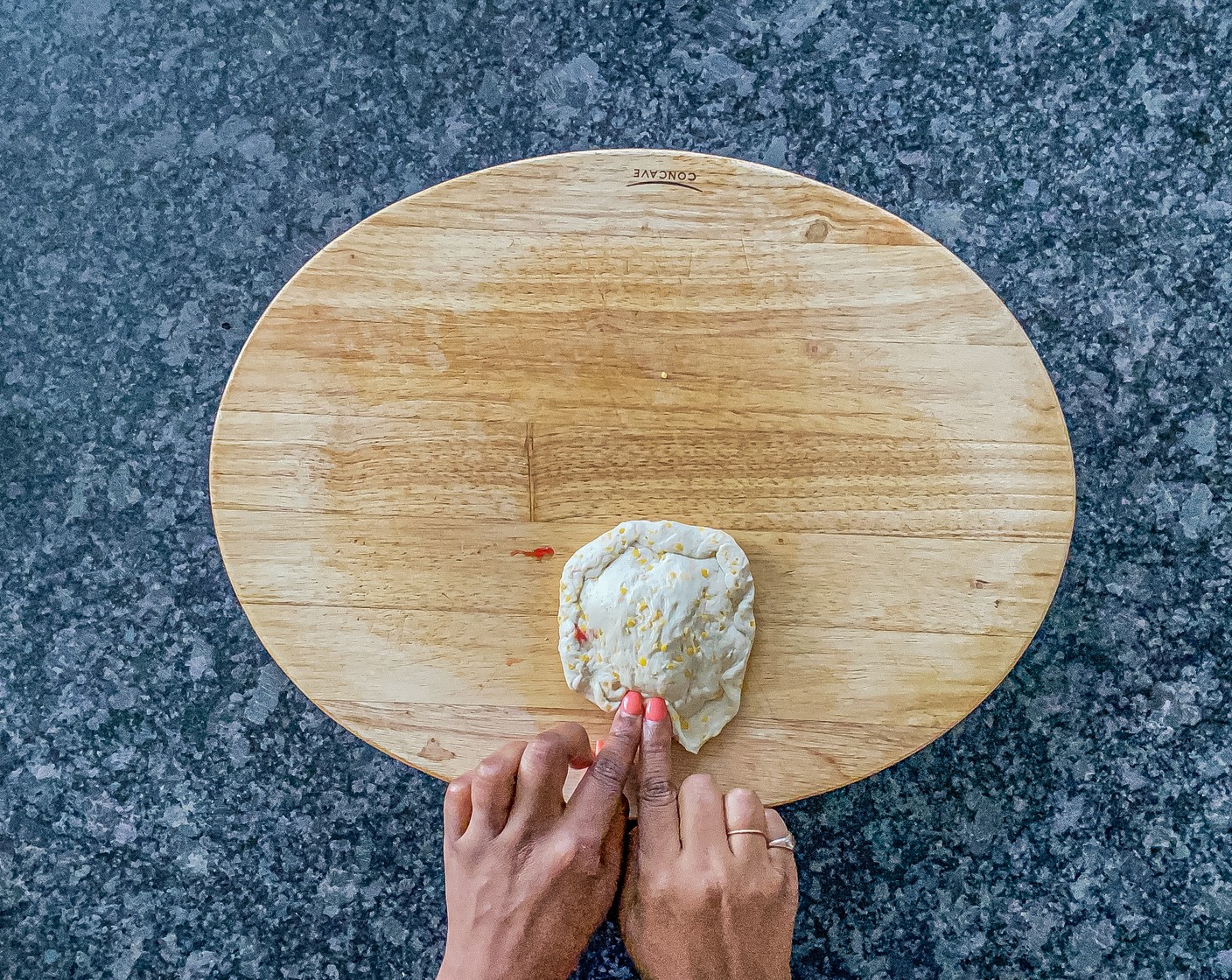 step 4 Top with a second biscuit and pinch the edges to secure the waffle is closed. Repeat for remaining biscuits.