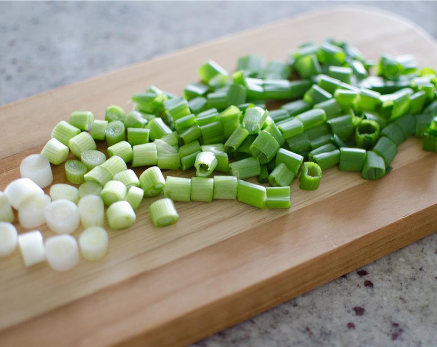 step 2 Pull fibrous string from top of peas. Peel and mince Garlic (2 cloves) and Shallot (1). Remove root end of Scallions (3 stalks) and chop white and light green parts..