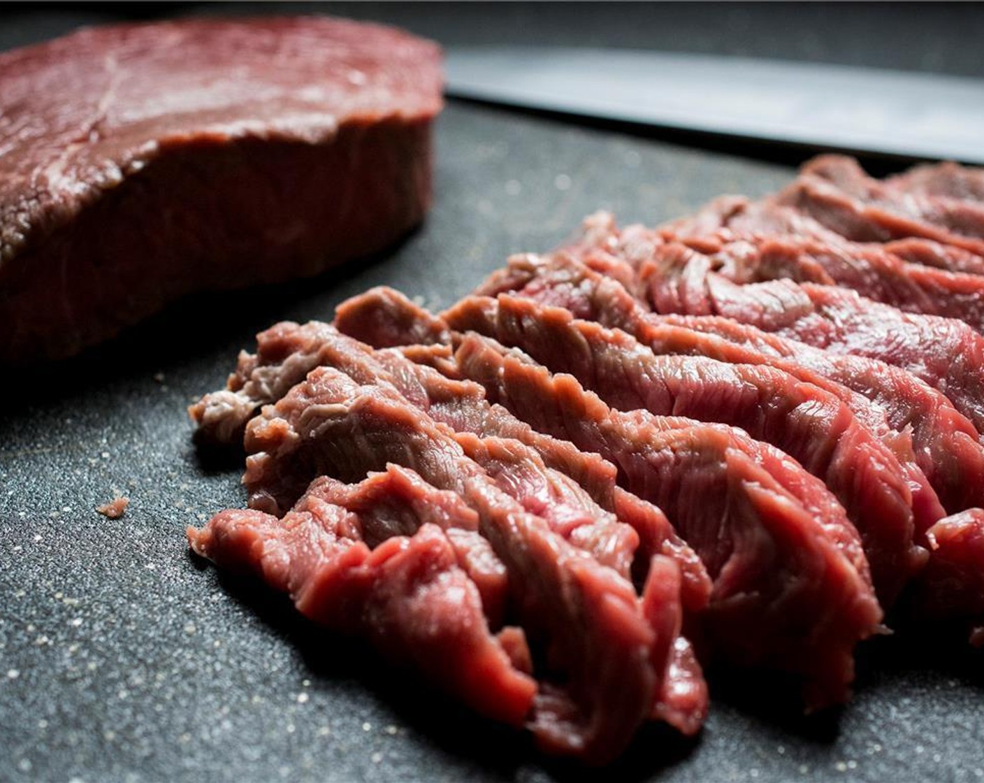 step 2 Slice the Sirloin Steak (1 lb) across the grain on a diagonal bias. Lightly pound each slice of beef to tenderize.