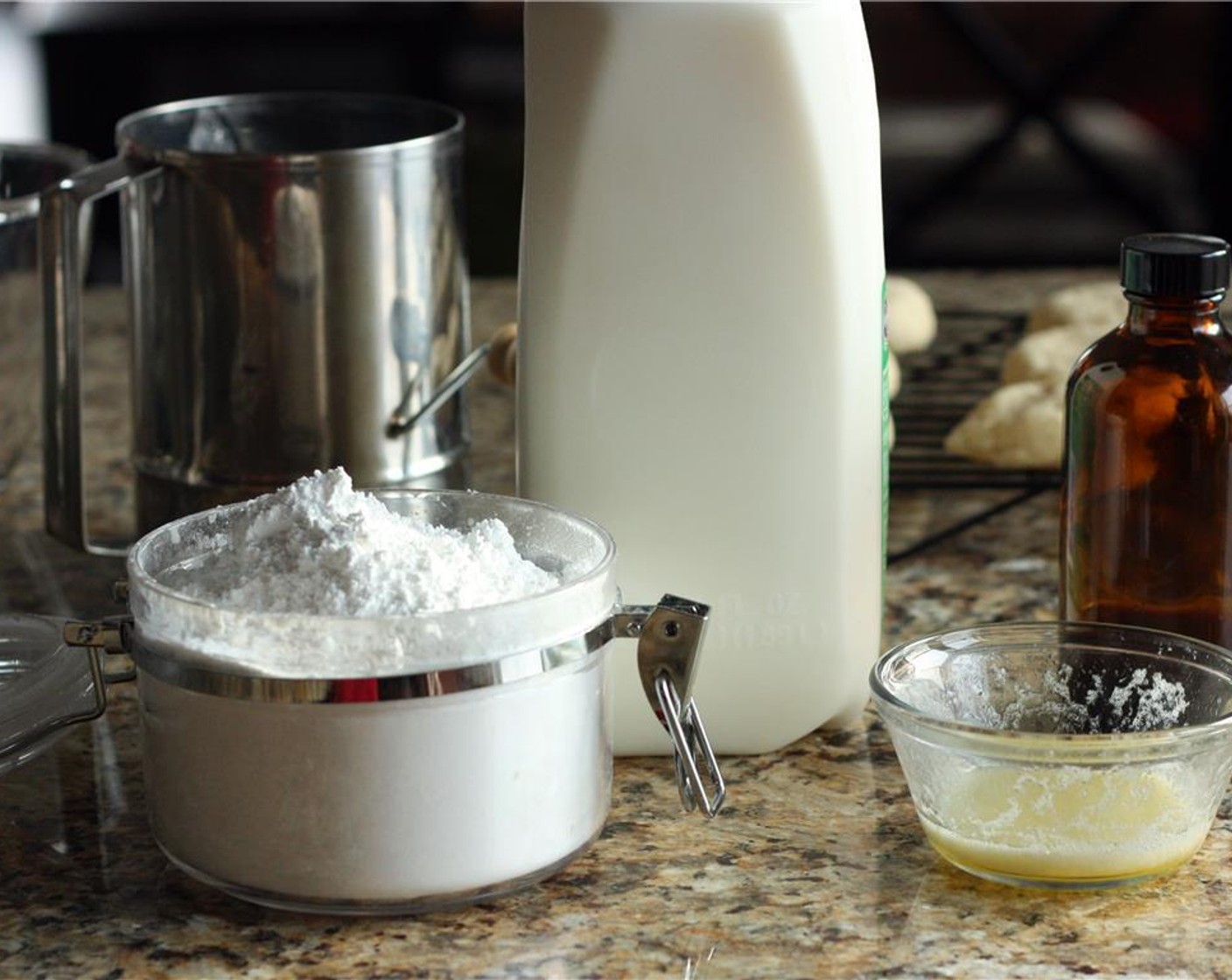 step 9 For the icing, melt the Unsalted Butter (1 1/2 Tbsp). Sift Powdered Confectioners Sugar (1 1/4 cups) into a small bowl. Add melted butter, Vanilla Extract (3/4 tsp), Milk (2 Tbsp), and a couple drops of green Green Food Coloring Gel (to taste) and whisk together.