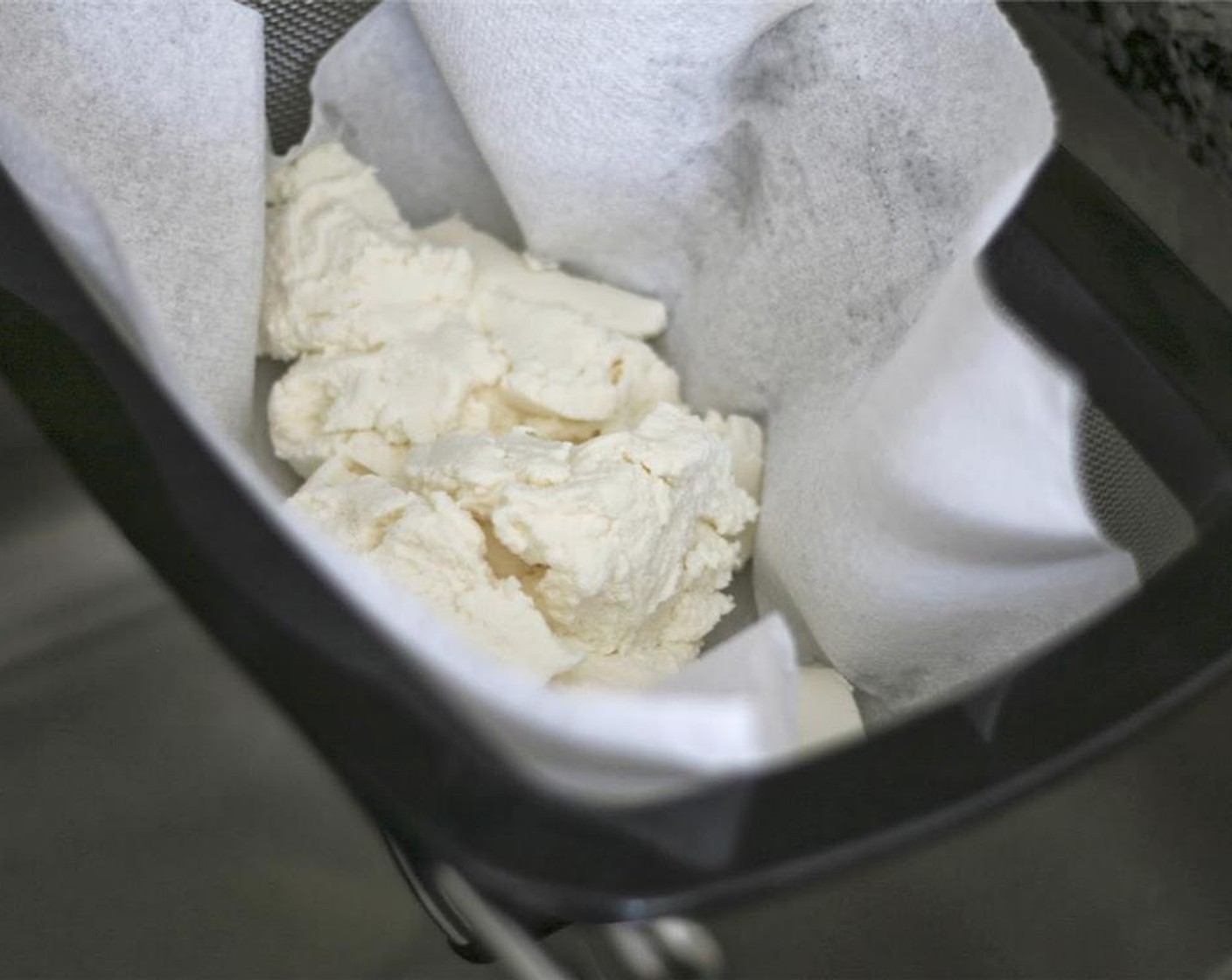 step 1 Set a strainer lined with paper towels over a bowl or sink. Add the Ricotta Cheese (1 cup) and let the cheese drain for about an hour.