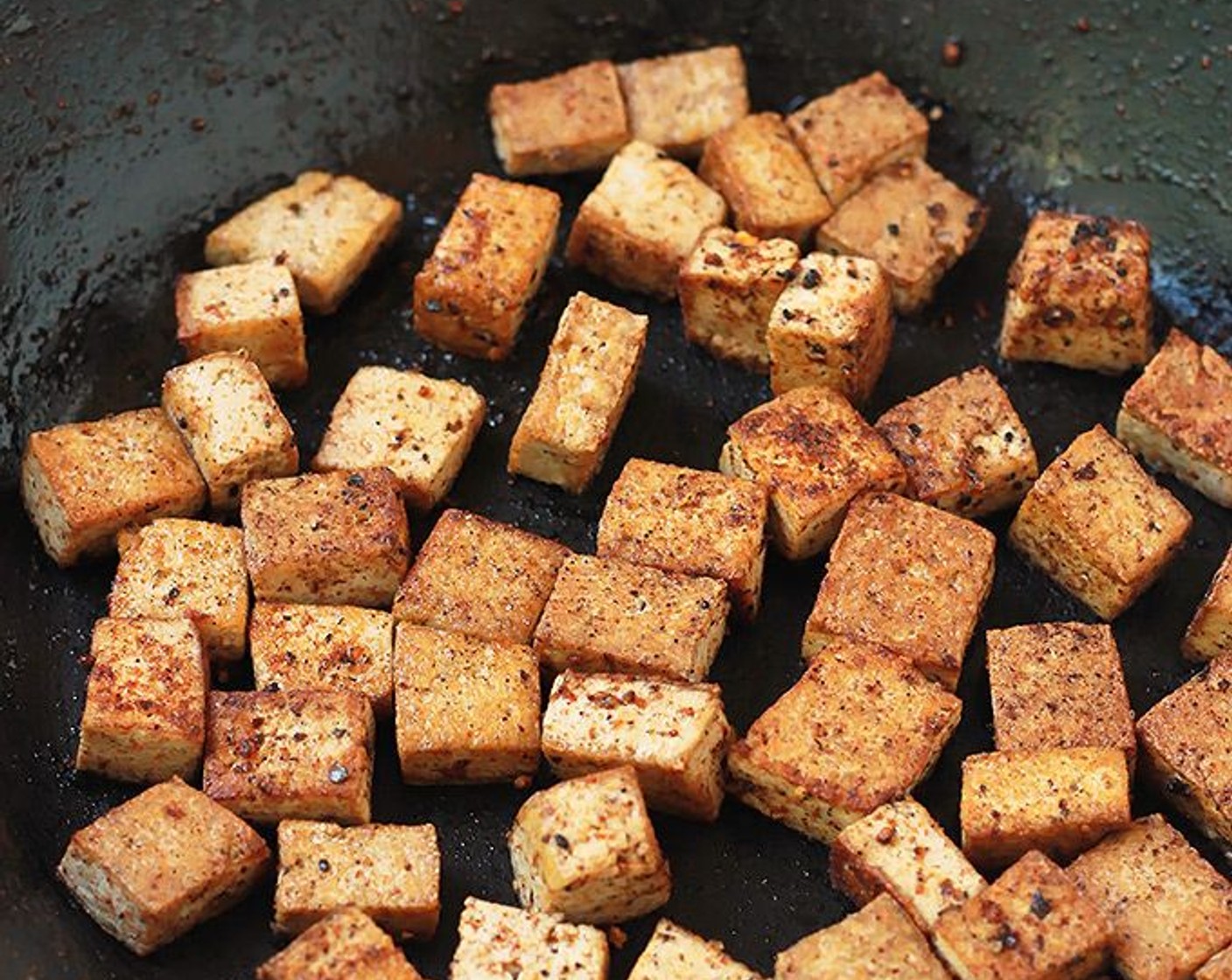 step 3 Heat a large skillet on medium heat, add Olive Oil (1/2 Tbsp) to pan and saute tofu in batches.