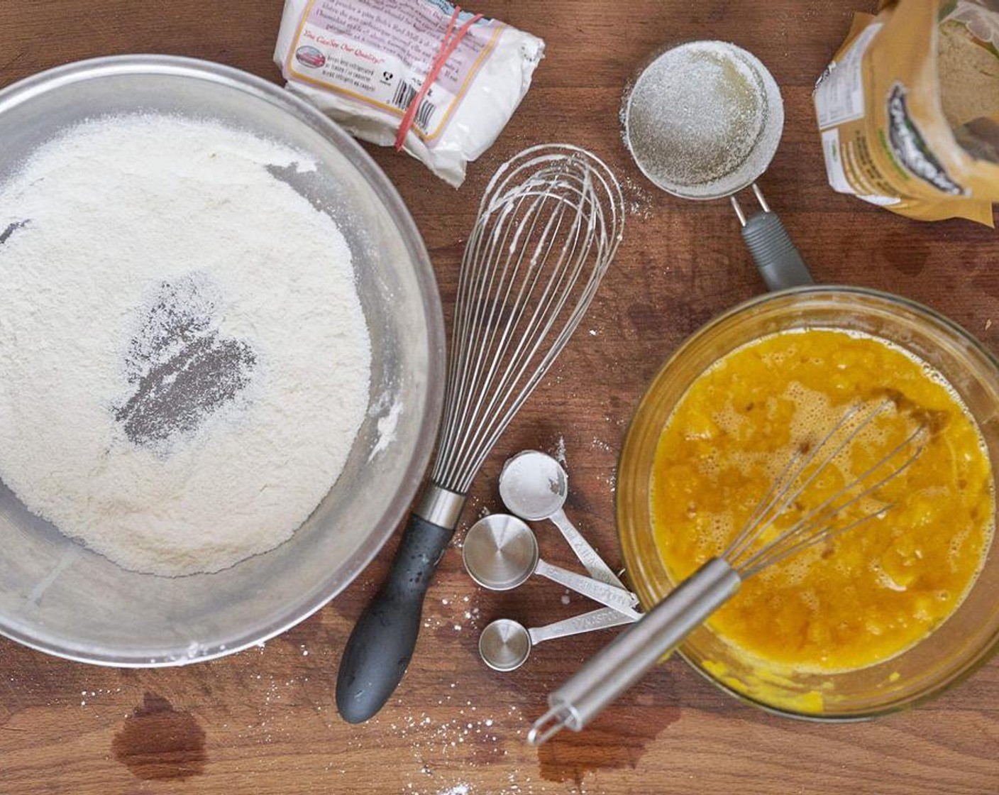 step 4 In a separate bowl, whisk Eggland's Best Classic Eggs (6), then add in Canned Pumpkin Purée (2/3 cup), Maple Syrup (1/2 cup), Coconut Oil (1/2 cup) and Pure Vanilla Extract (2 tsp).