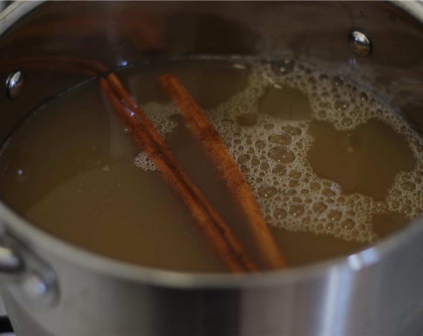 step 3 Add Apple Cider (4 cups) and Cinnamon Sticks (2) to a medium pot.