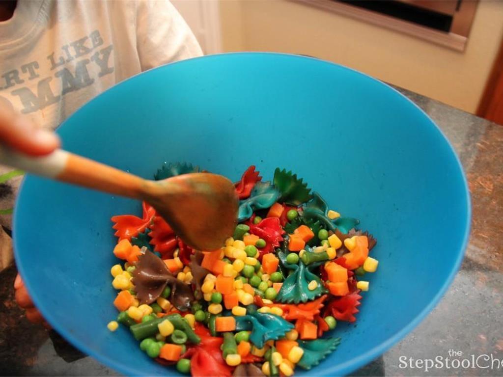 Step 8 of Rainbow Pasta Salad Recipe: Mix everything together.